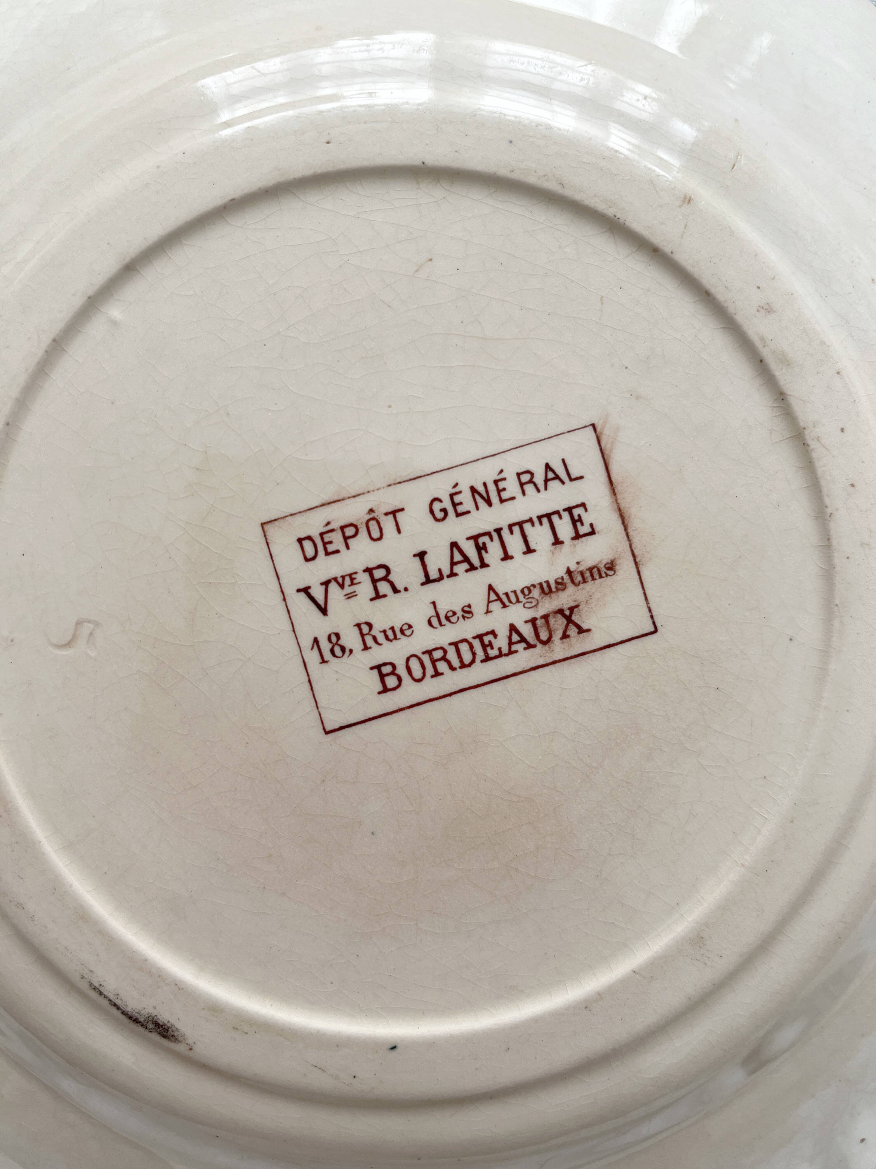 Assiette à dessert en terre de fer "Trémières" faïencerie de Salins