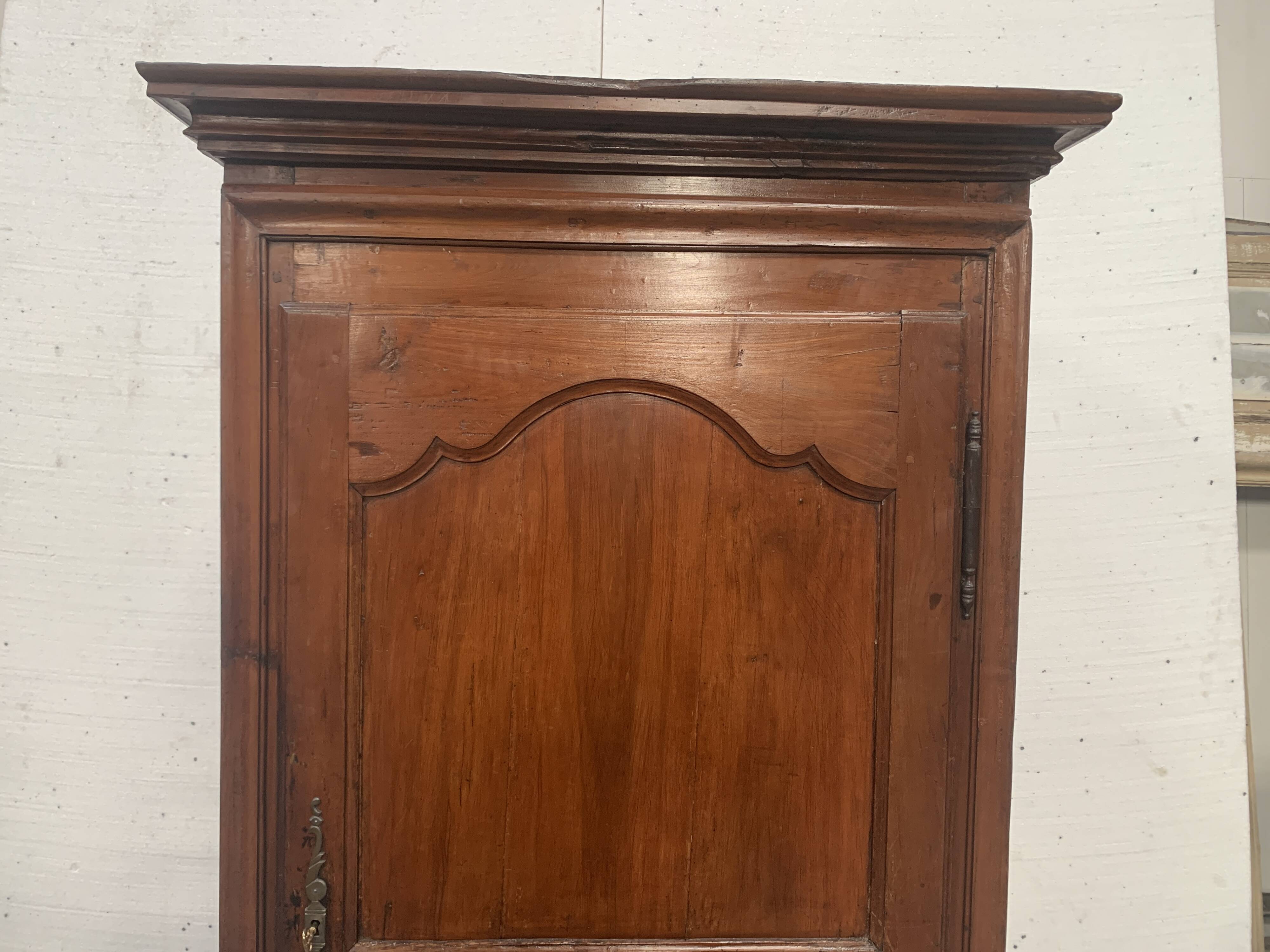 Louis Philippe style bonnetière in solid cherry wood, 19th century