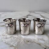 Set of 3 small silver 970 sterling cups with enamelled flags from the 20th century.