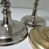 three brass and chrome candle holders early twentieth century