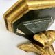 Wall-mounted console in painted gold wood