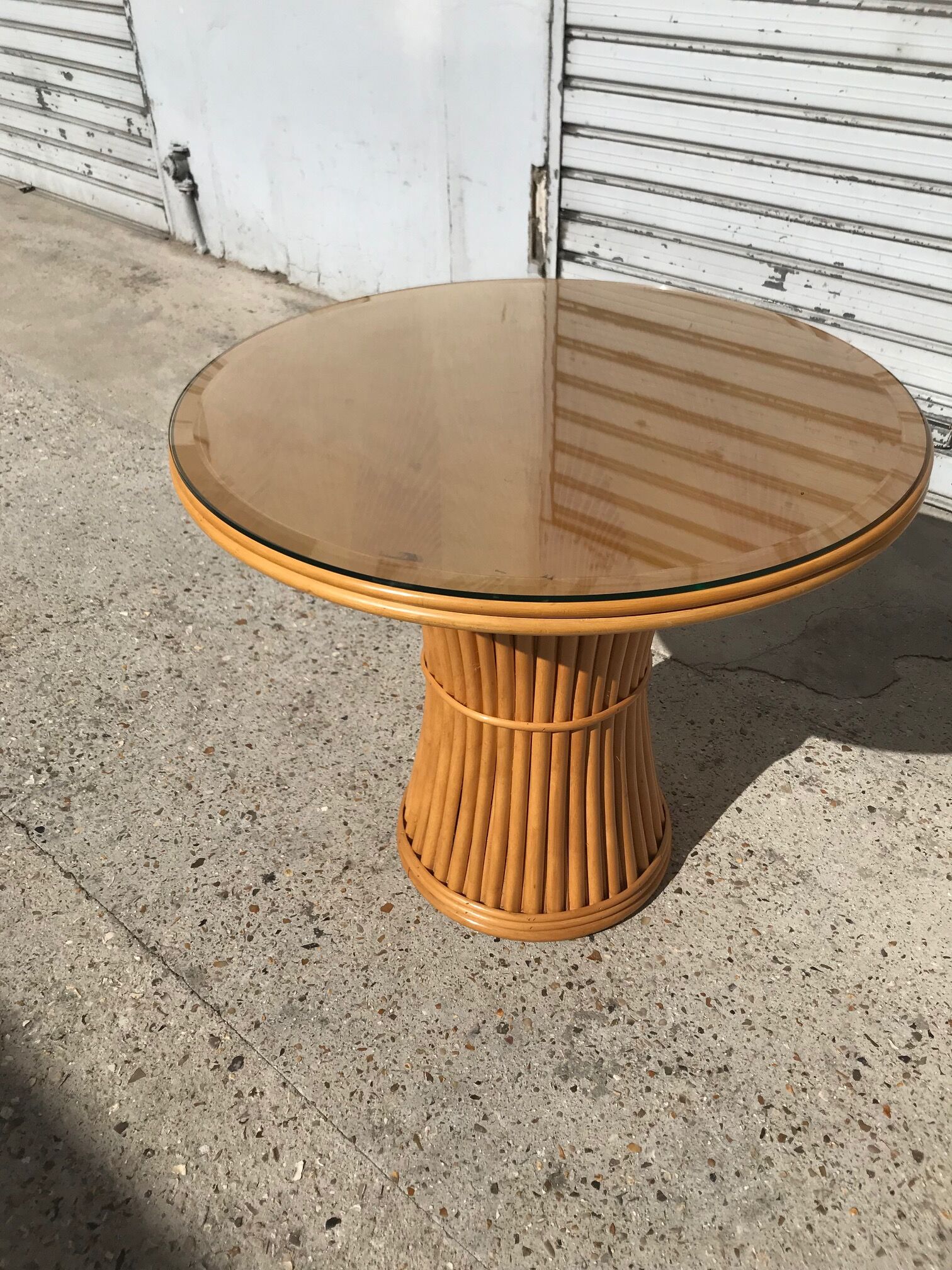 Dining table, rattan and glass