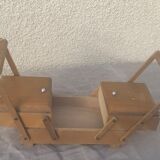 Sewing box in old varnished wood
