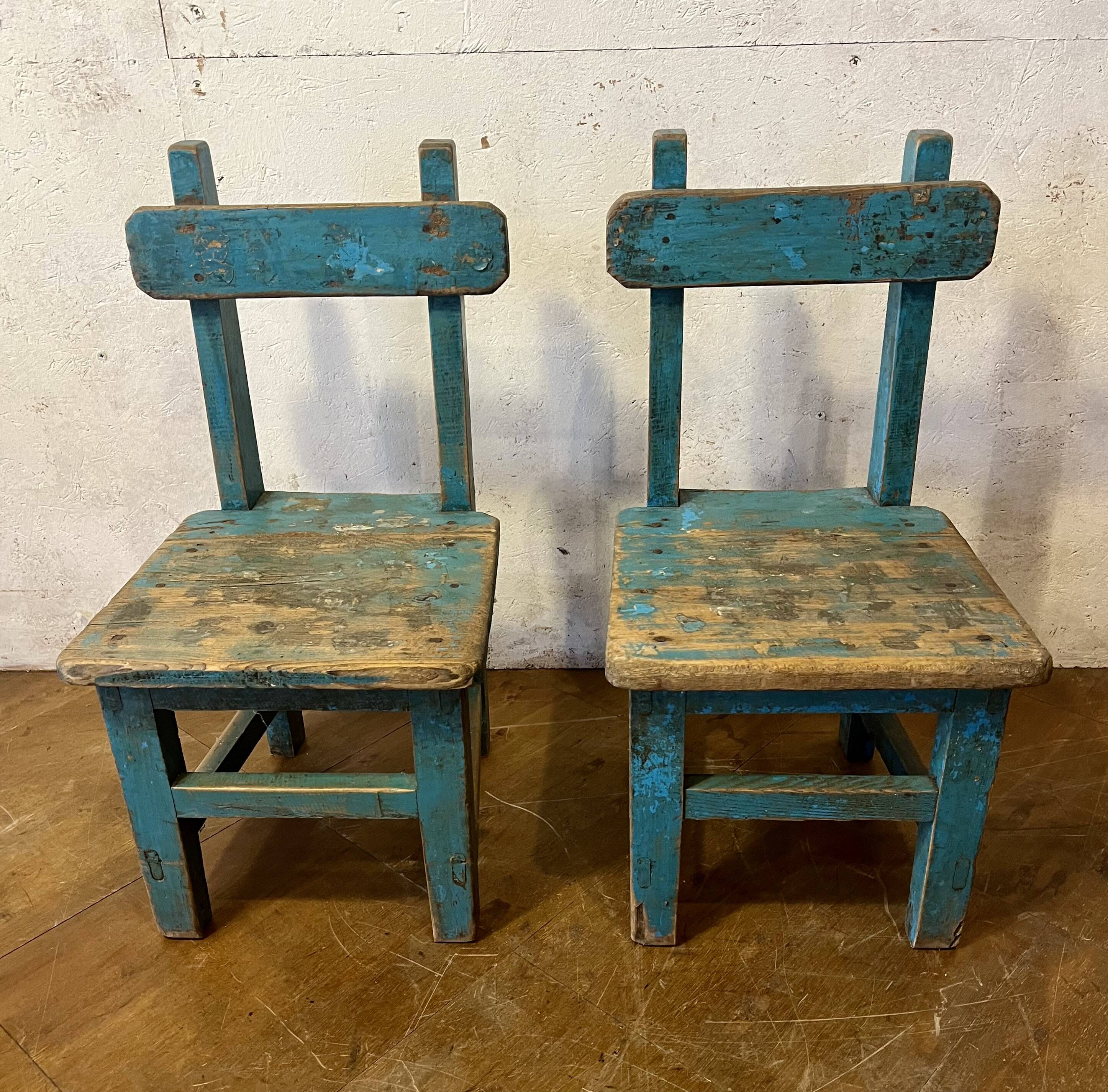 Old pair of small children's school chairs