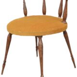 Mustard gondola armchair in the style of Helmut.