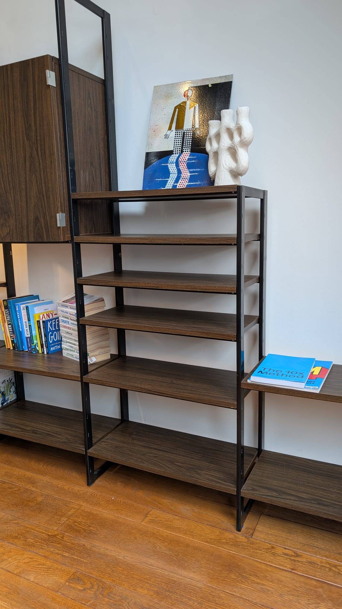 Modular rosewood bookcase by Pierre Guariche for Meurop