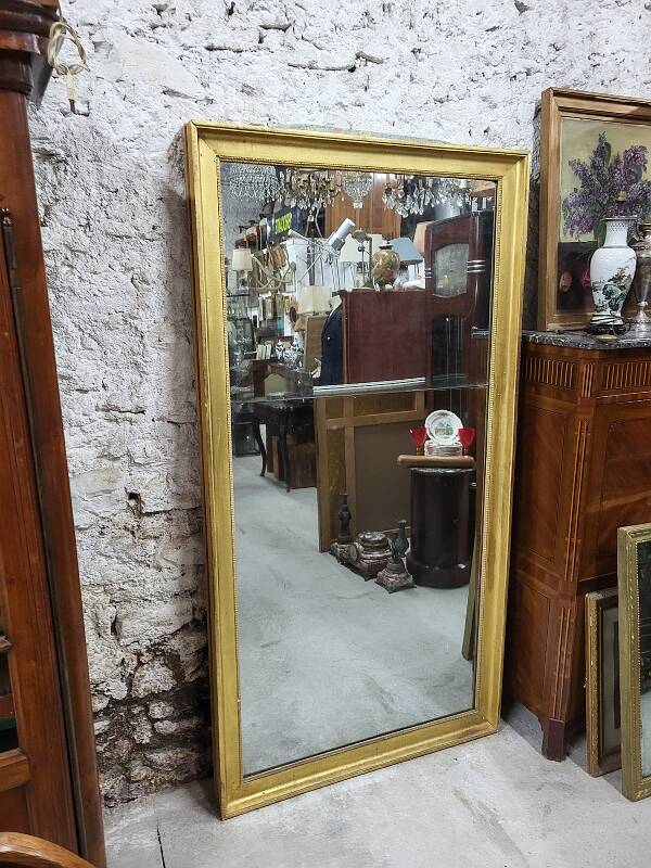 Large gilt mirror in 2 parts from the early 19th century