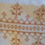 Damask tablecloth with golden patterns