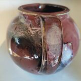 Stoneware pitcher by Matthieu Liévois in shades of red