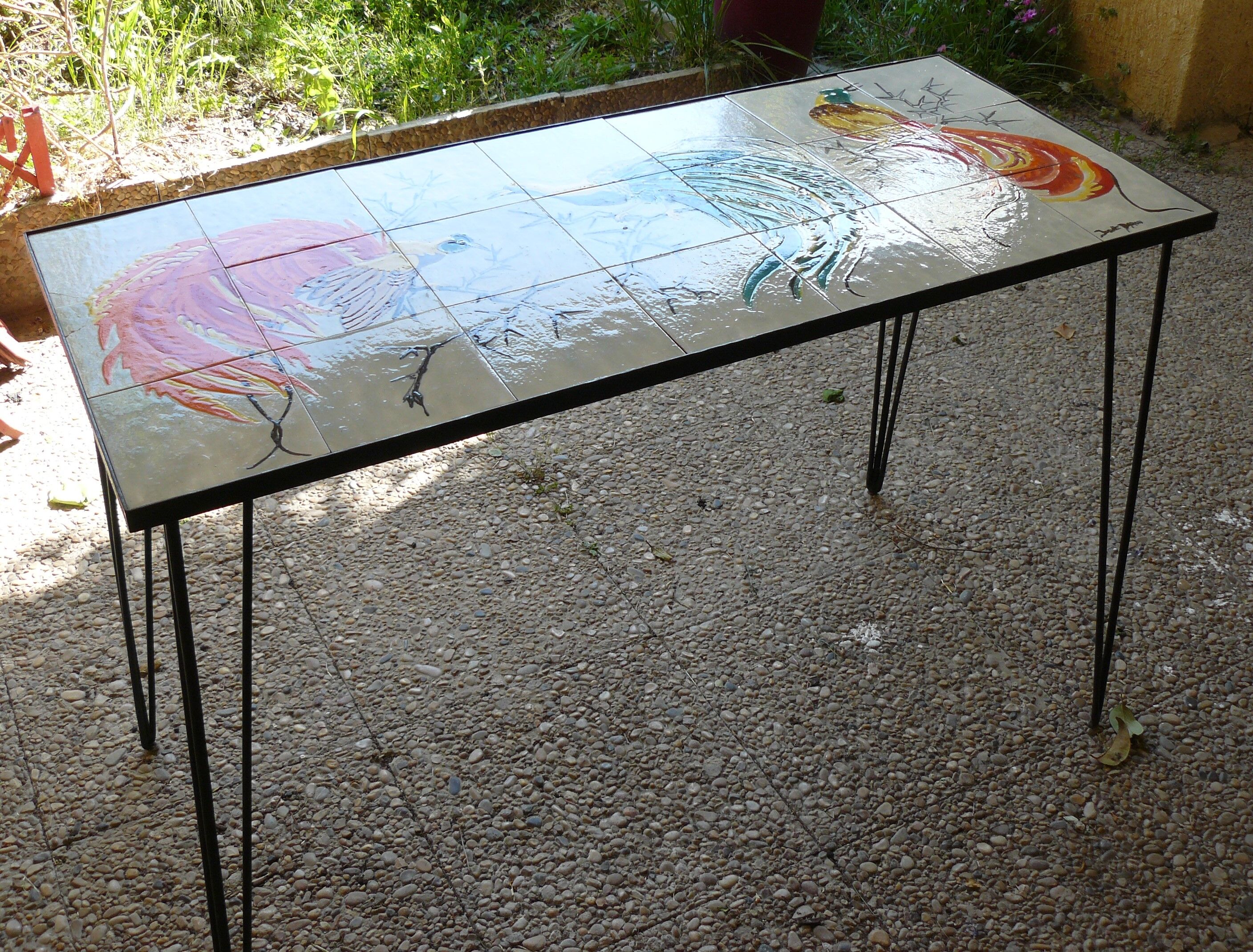 Metal and ceramic table