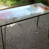 Metal and ceramic table