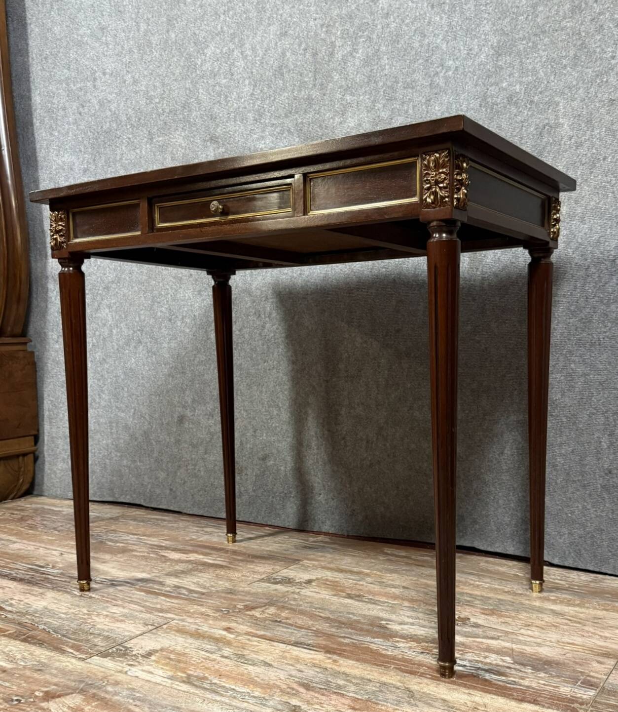 Parisian Louis XVI style desk in mahogany and gilded bronze