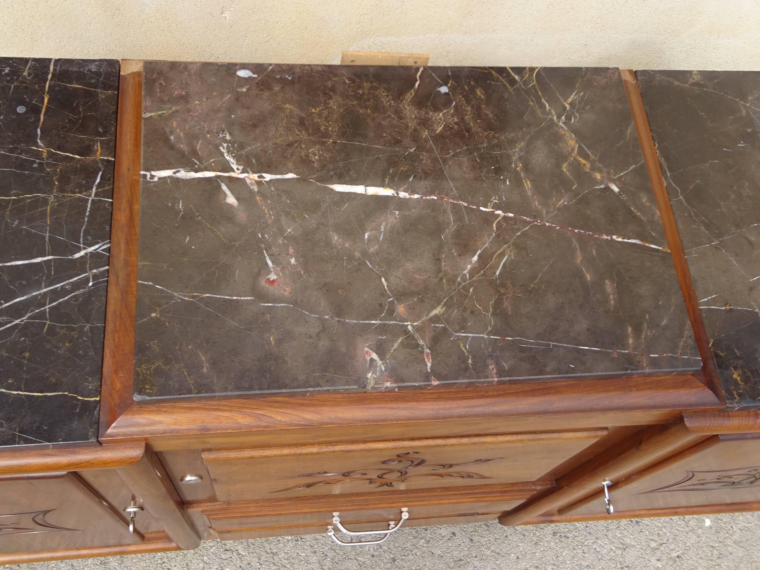 Solid walnut sideboard, moustache legs, black marble top.