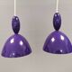 Two purple hanging lamps from Norway Says for Muuto, model Mhy