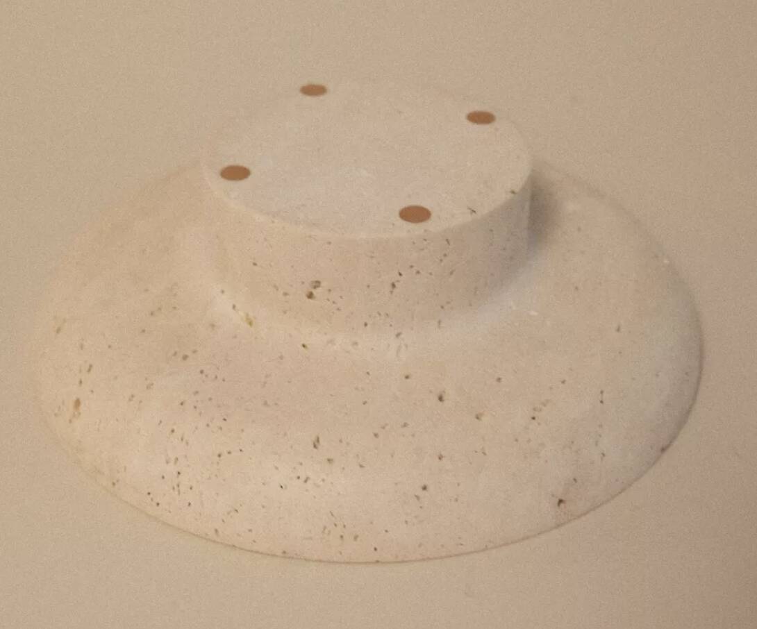 Travertine pocket emptier