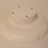Travertine pocket emptier