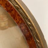 Oval frame imitation magnifying glass