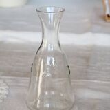 Vintage glass carafe with embossed bee motifs