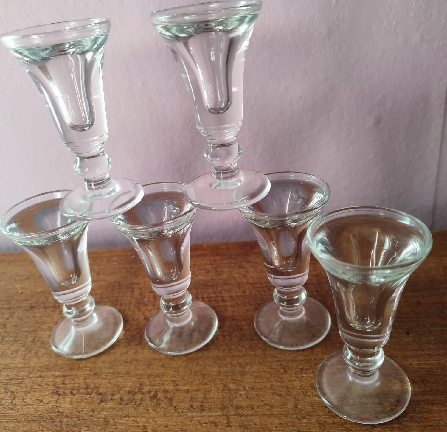 Set of 6 antique glasses known as "false bottom" glasses.