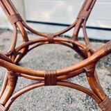 Round rattan and wicker table with glass top