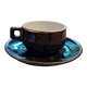 Green and gold coffee cups and sub-cups