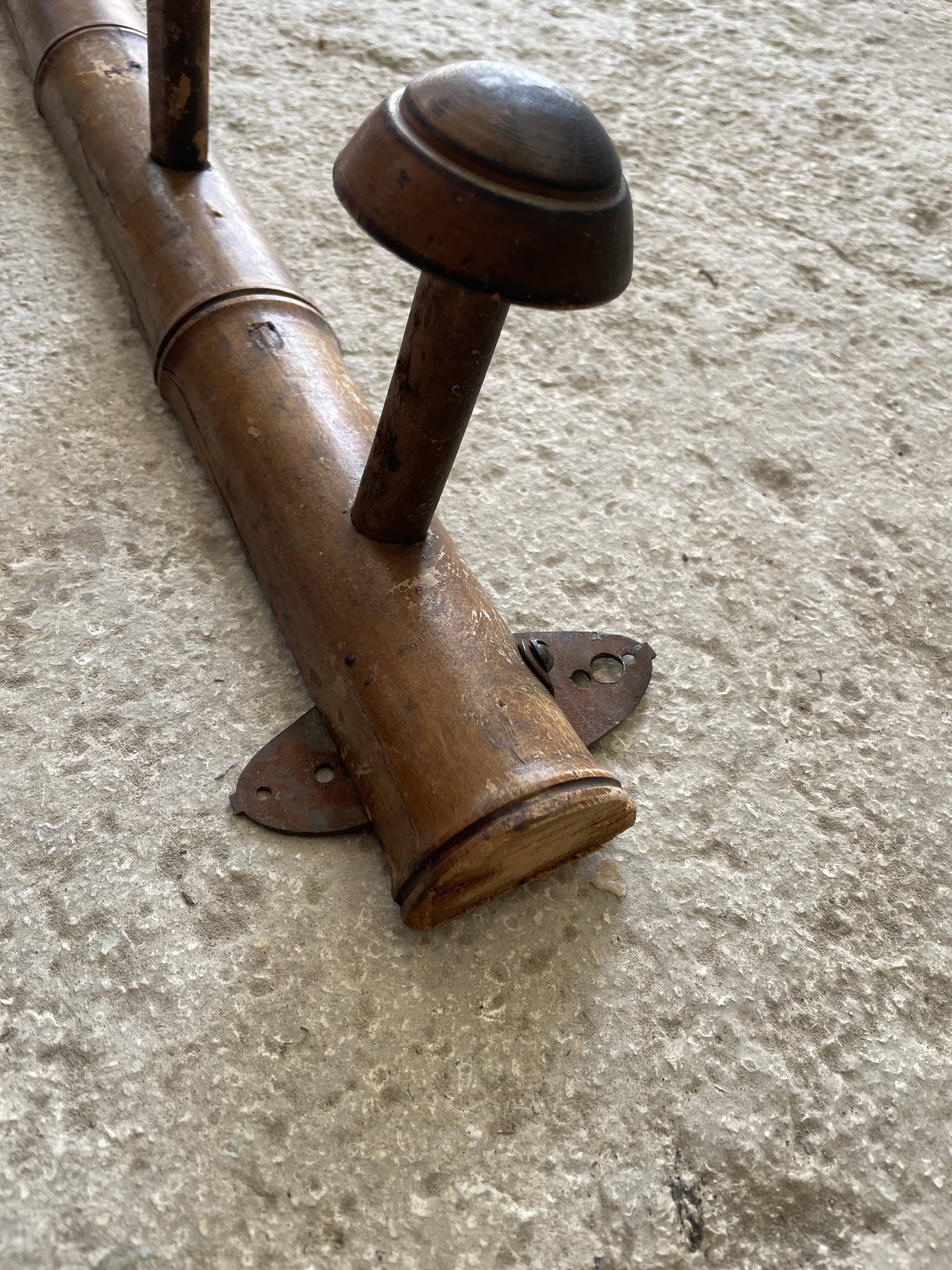 Old wooden wall coat rack