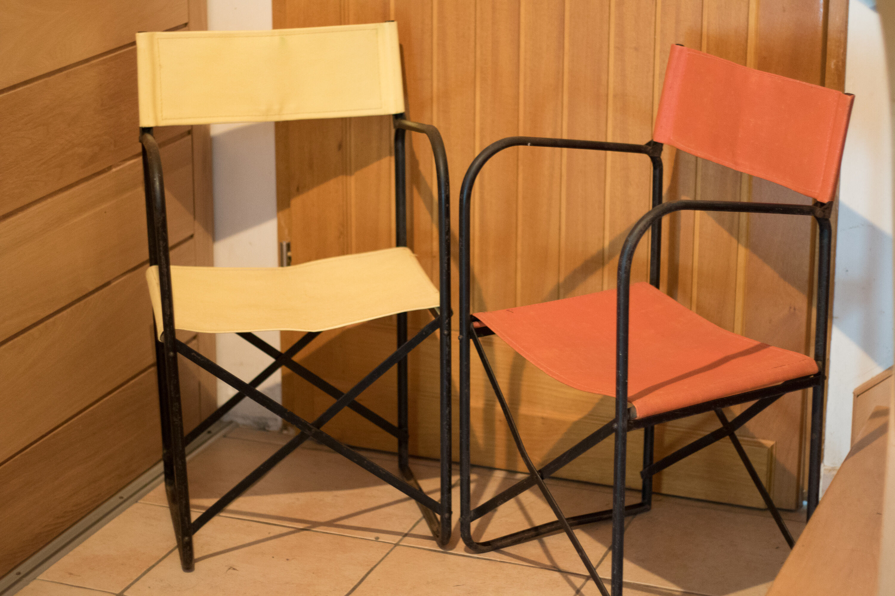 Pair of folding chairs according