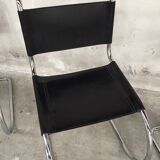 Set of 4 black leather chairs by Ludwig Mies Van Der Rohe