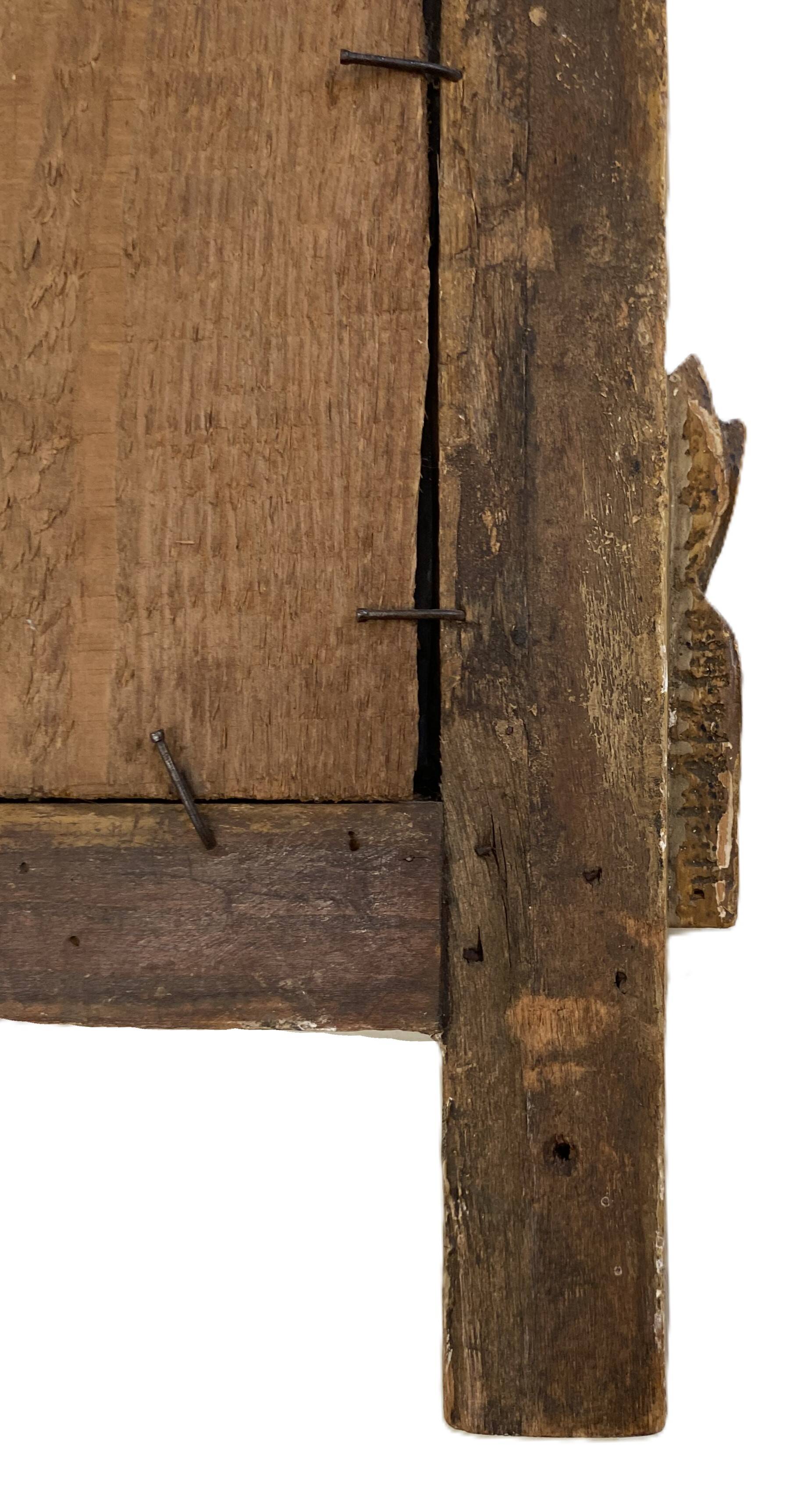 Petit miroir de dame Louis XVI en bois sculpté et doré