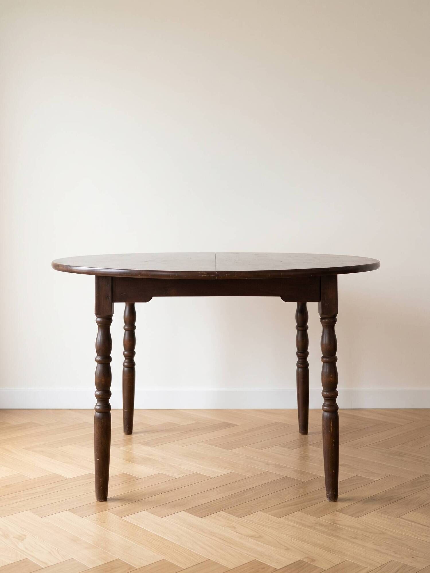 Traditional round wooden dining table