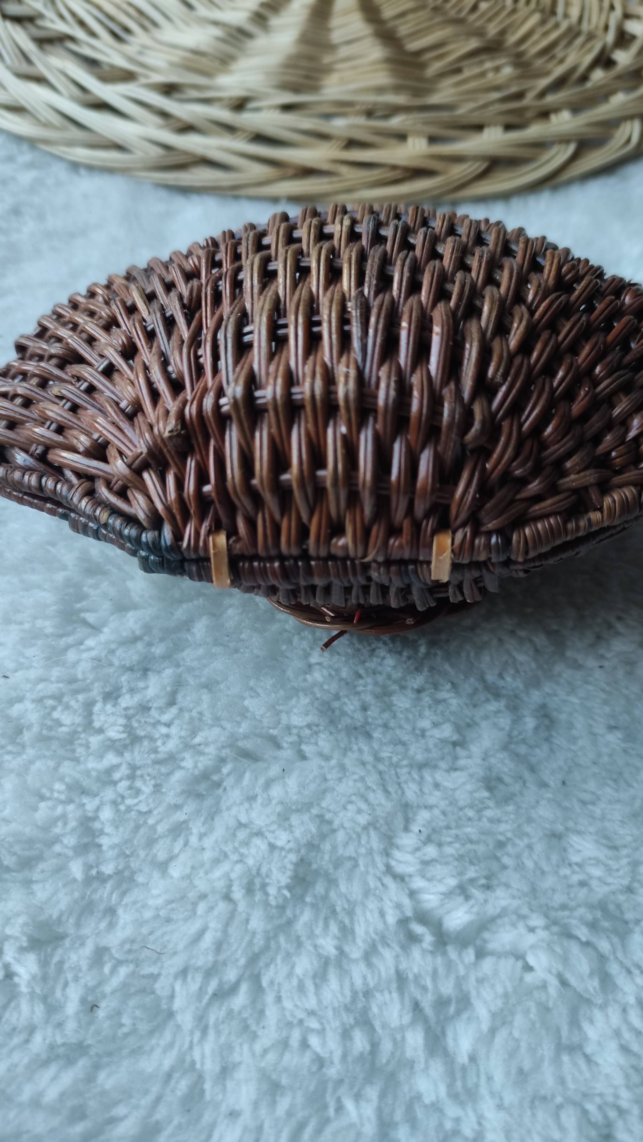 Vintage box in woven wicker shell shape