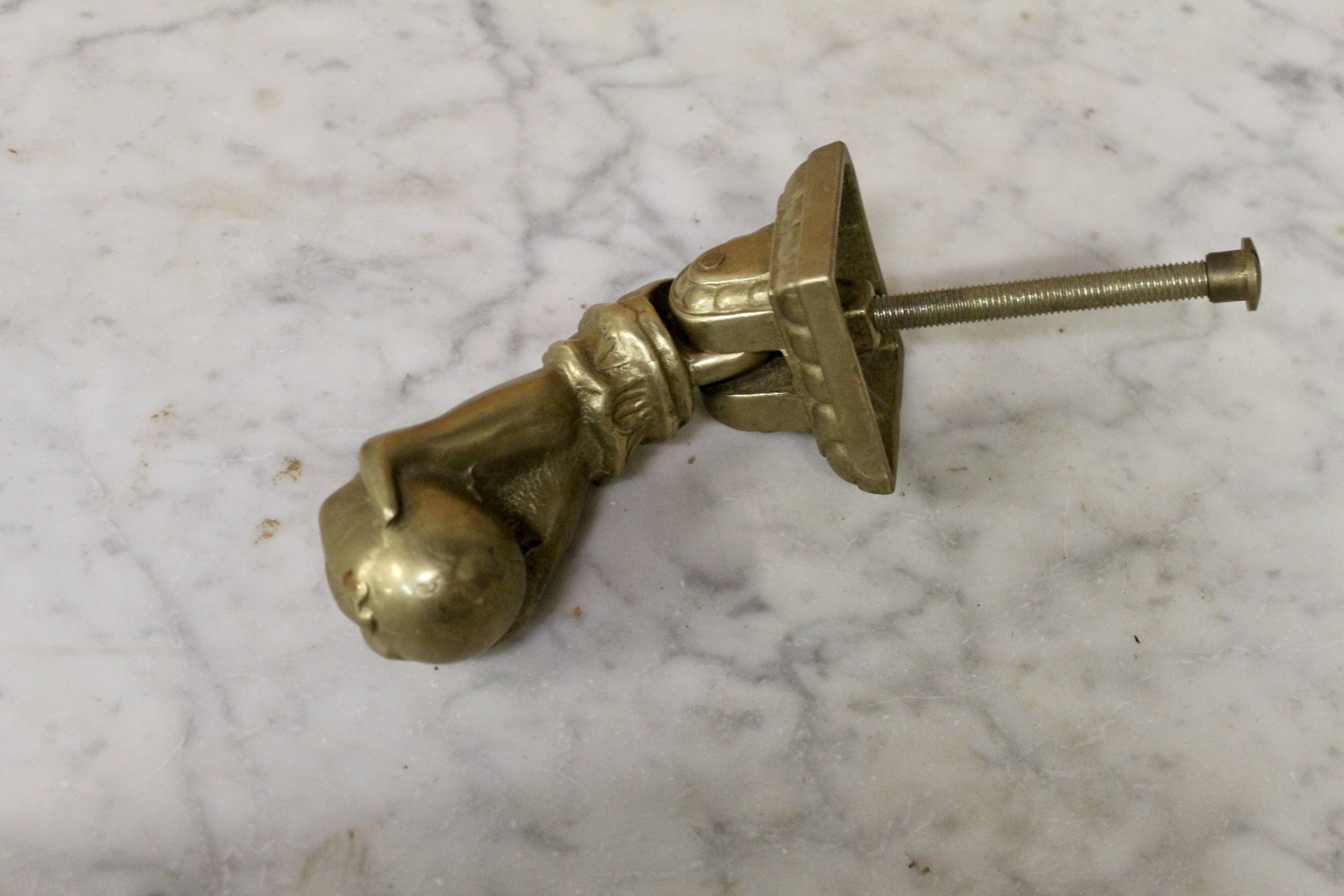 Solid bronze door knocker, hand shape, 19th century