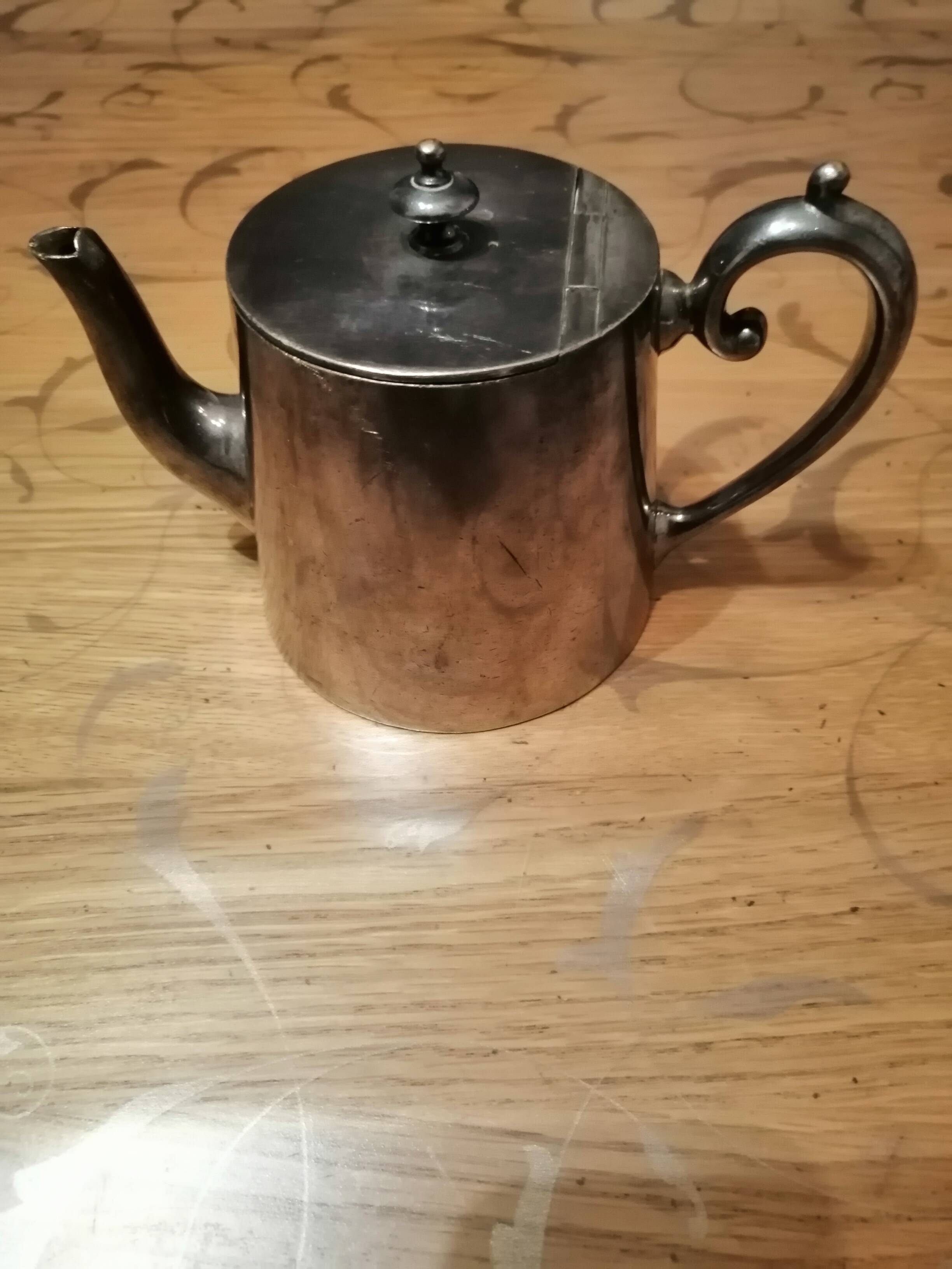 small silver-plated teapot