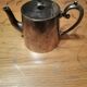 small silver-plated teapot