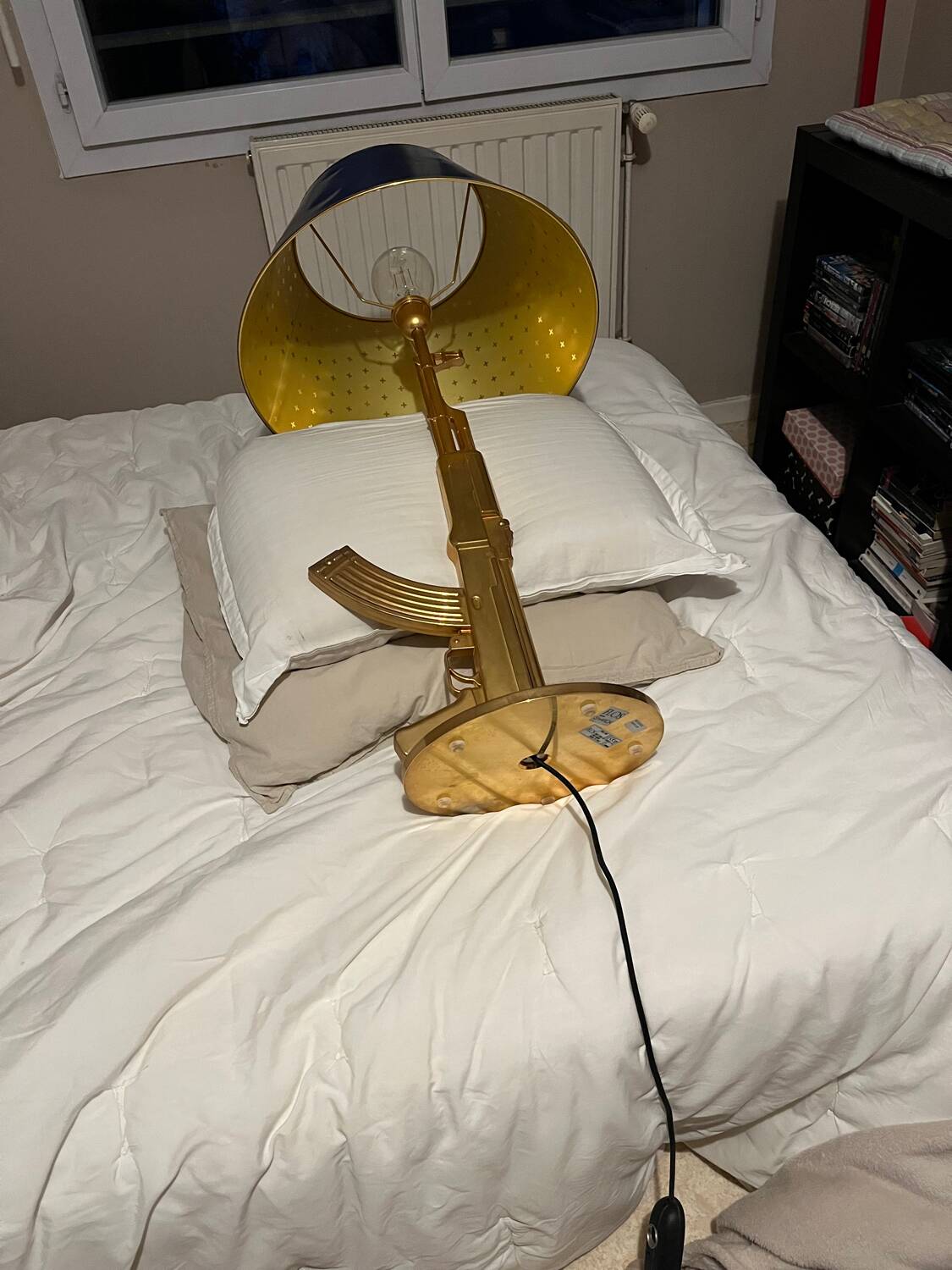 Starck gun lamp for flos