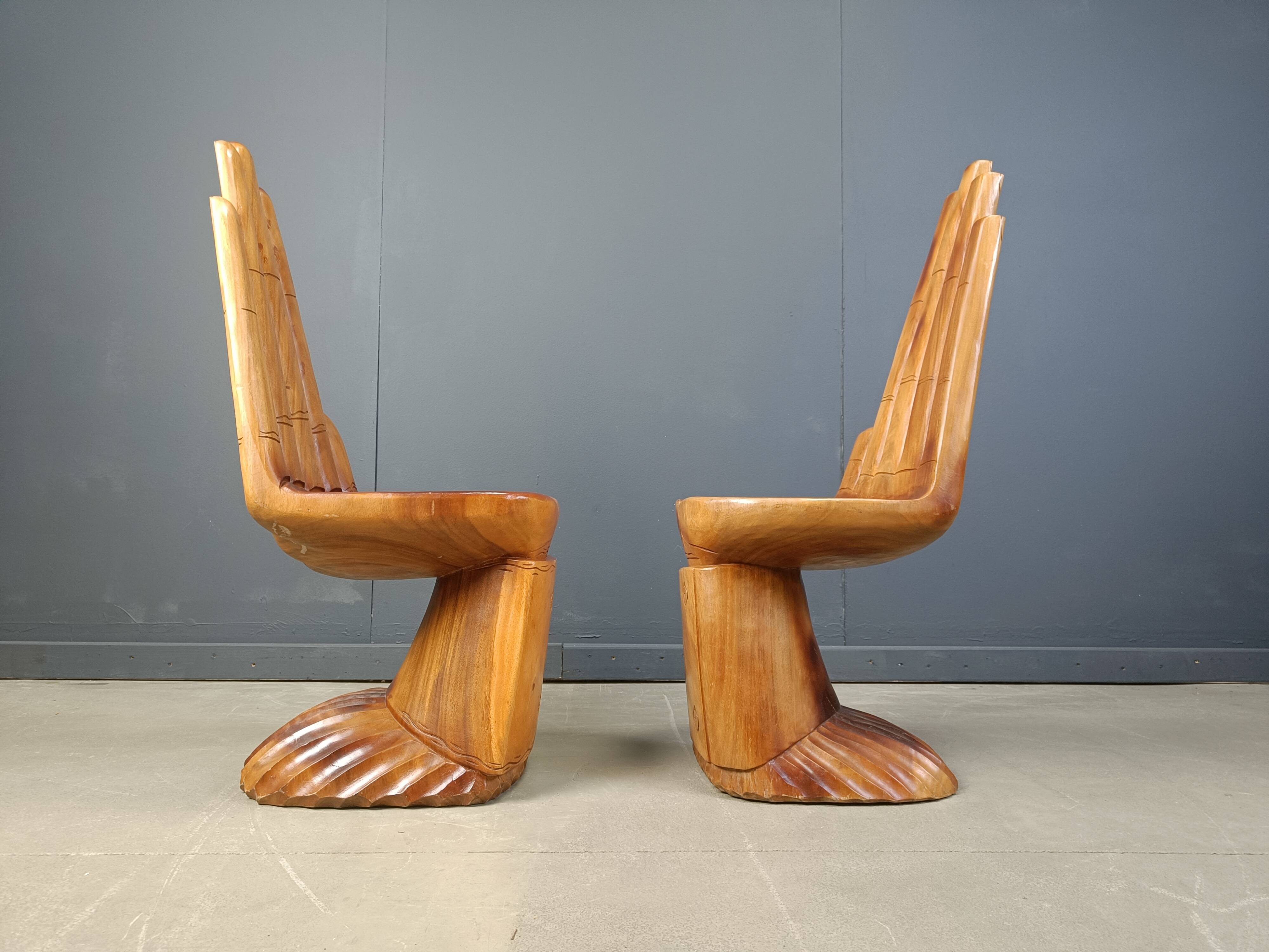 Pair of hand shaped teak chairs, 1970s