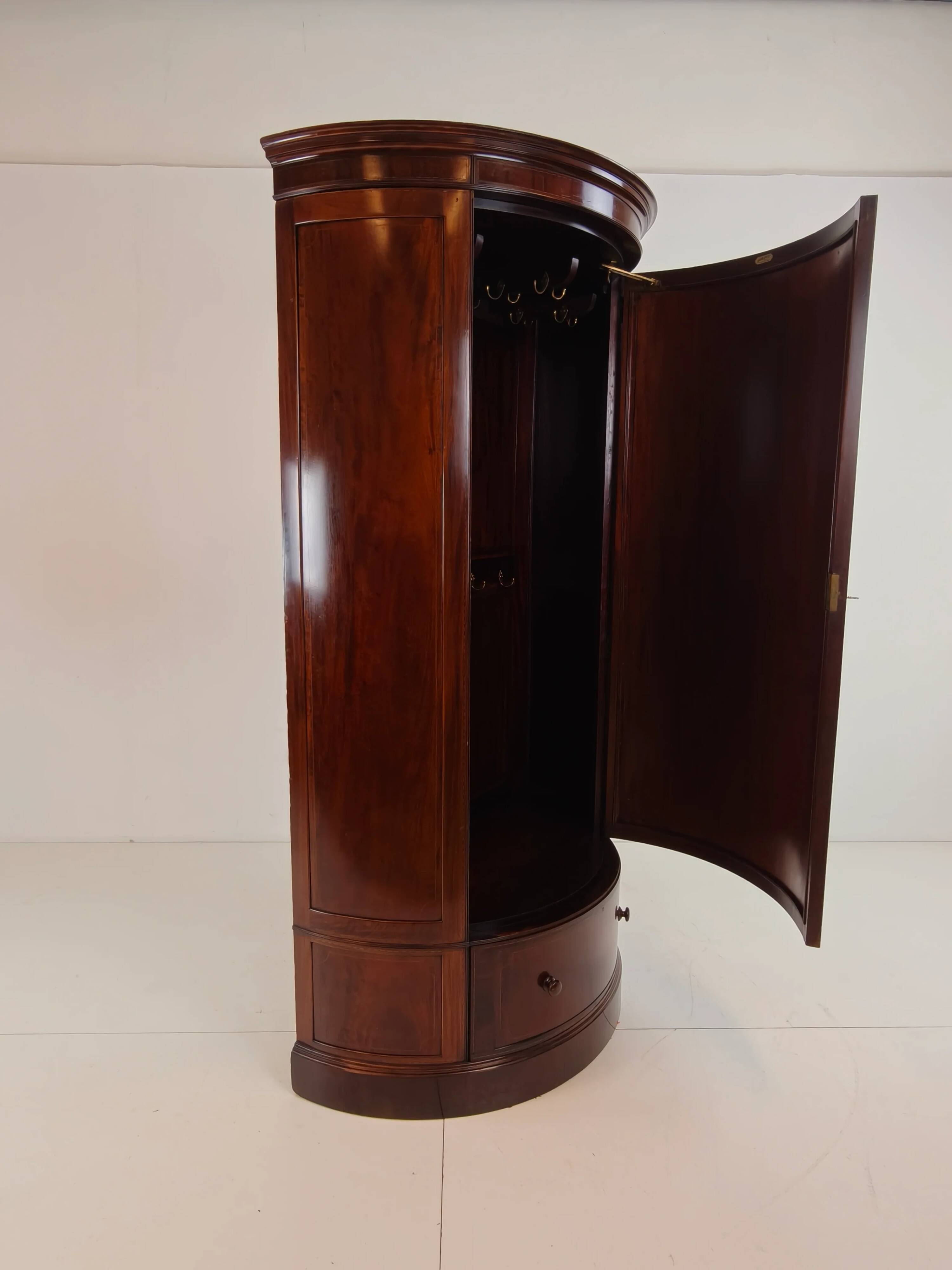Edwardian mahogany bow-fronted wardrobe by Maple & Co