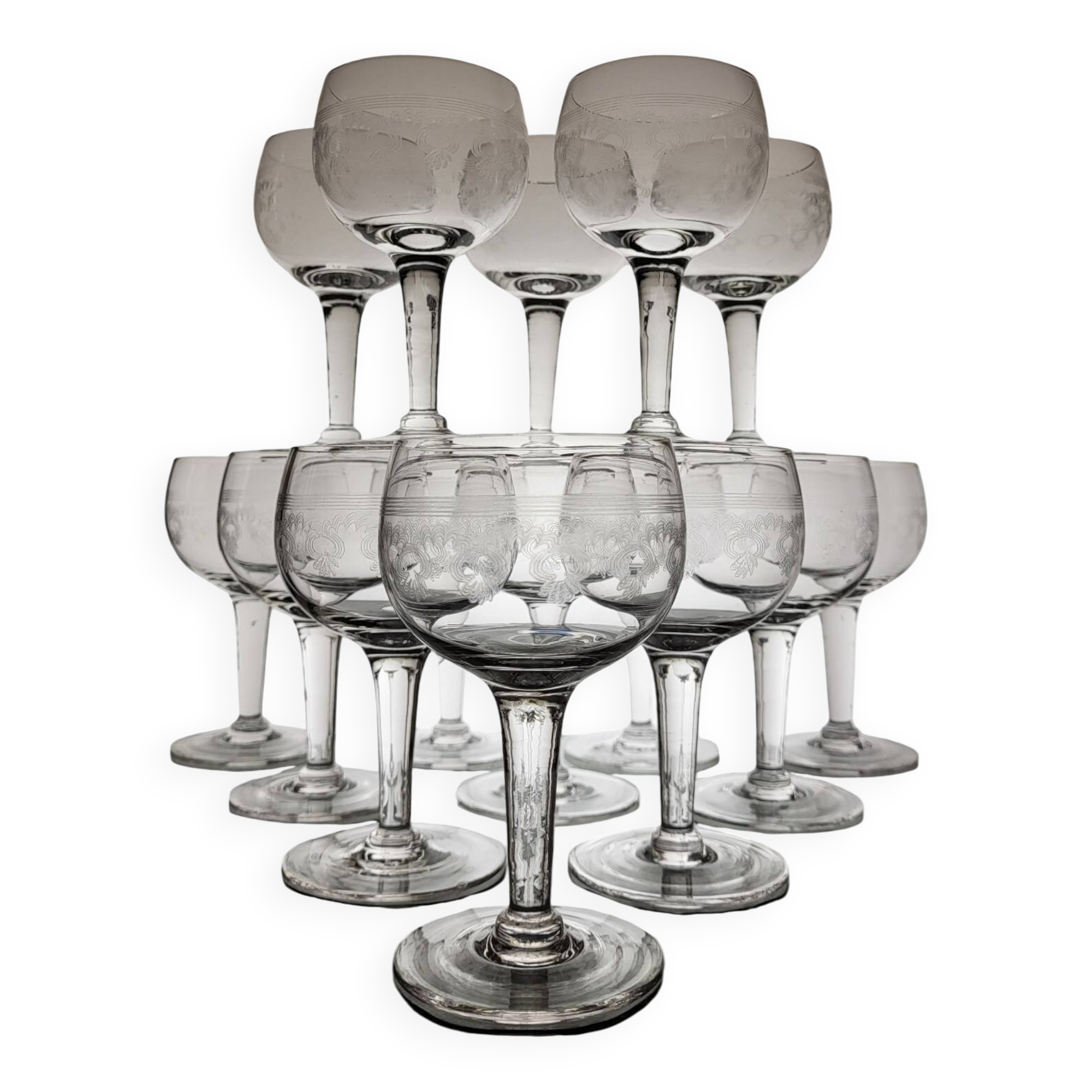 Page 4 of 8 9 guilloché wine glasses, early 20th century