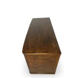 A vintage Italian chest of drawers, made of veneered walnut and solid wood,