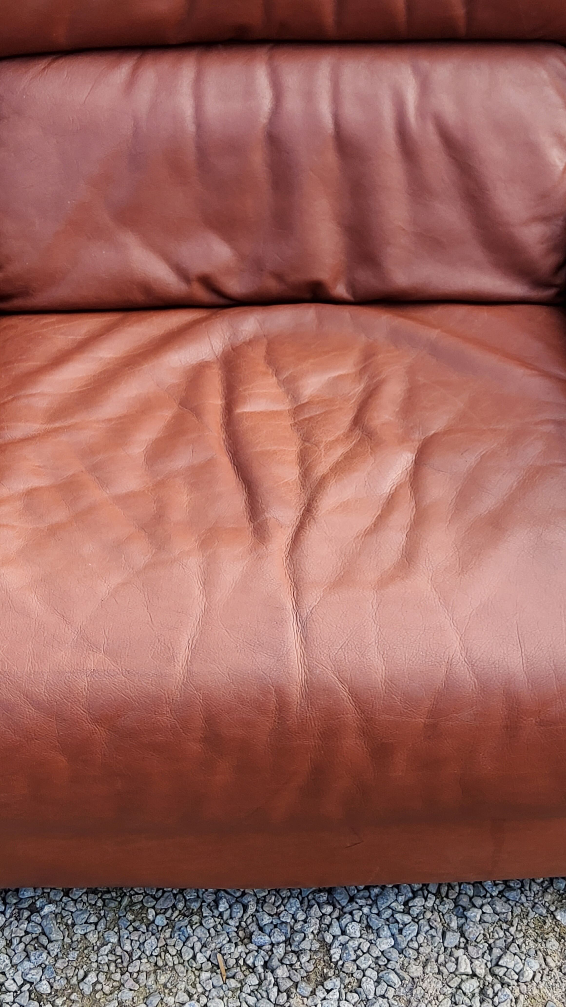 Pair of armchairs and De Sede sofa in cognac leather from the 70s/80s