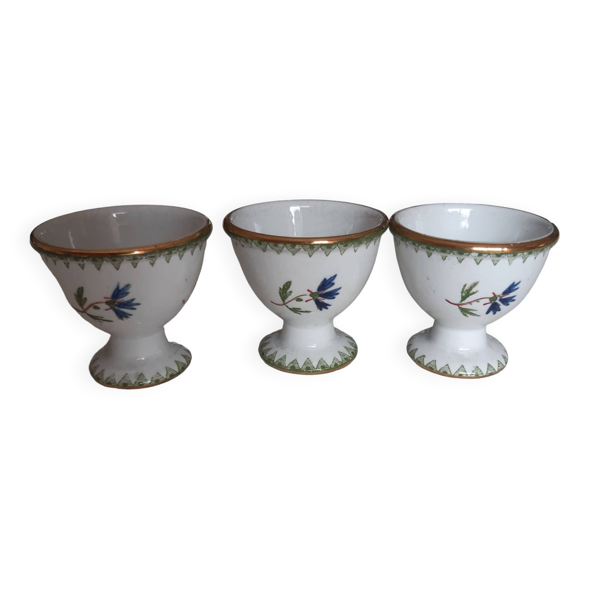 Set of three egg cups, barbel pattern decorations