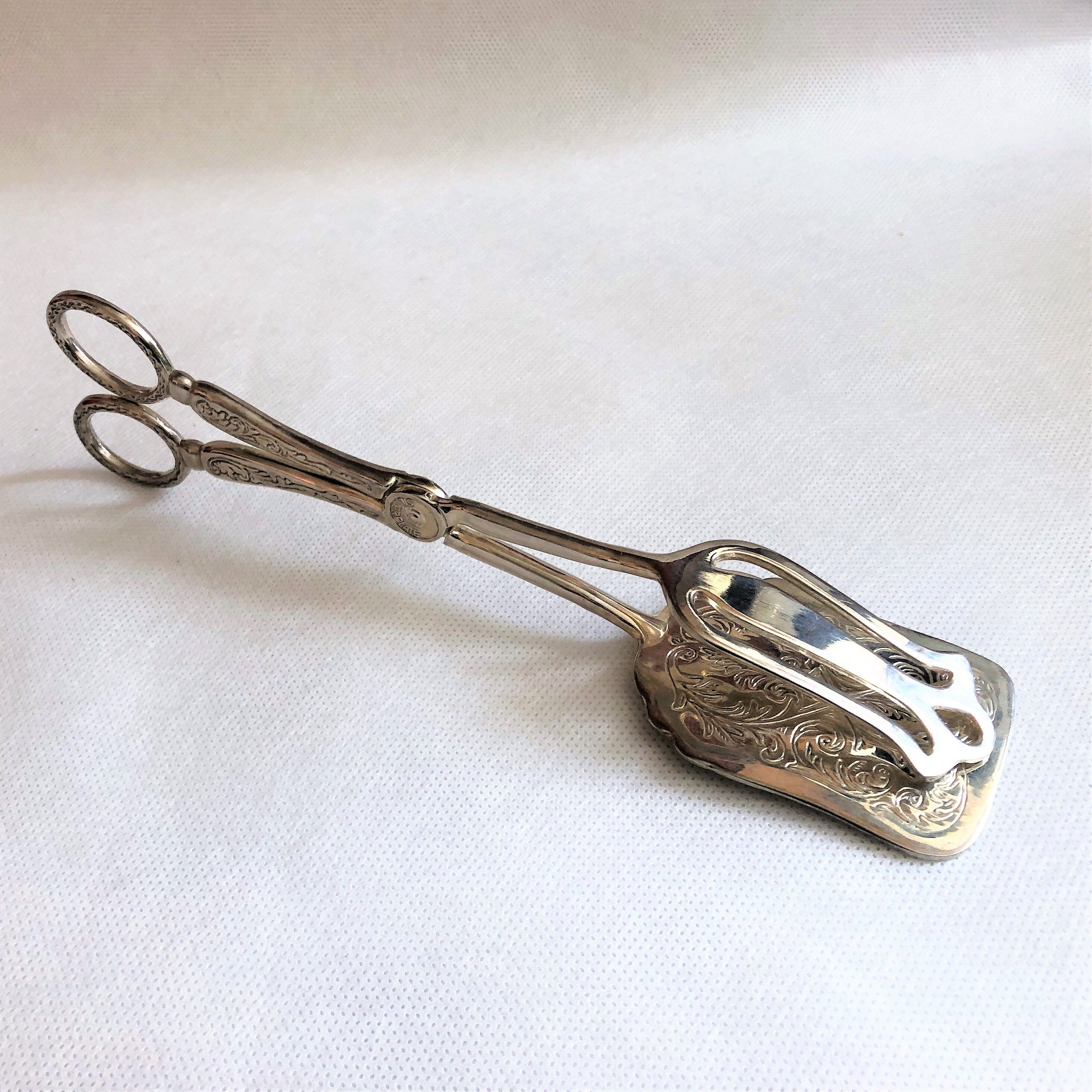 Wrought silver plated cake clips