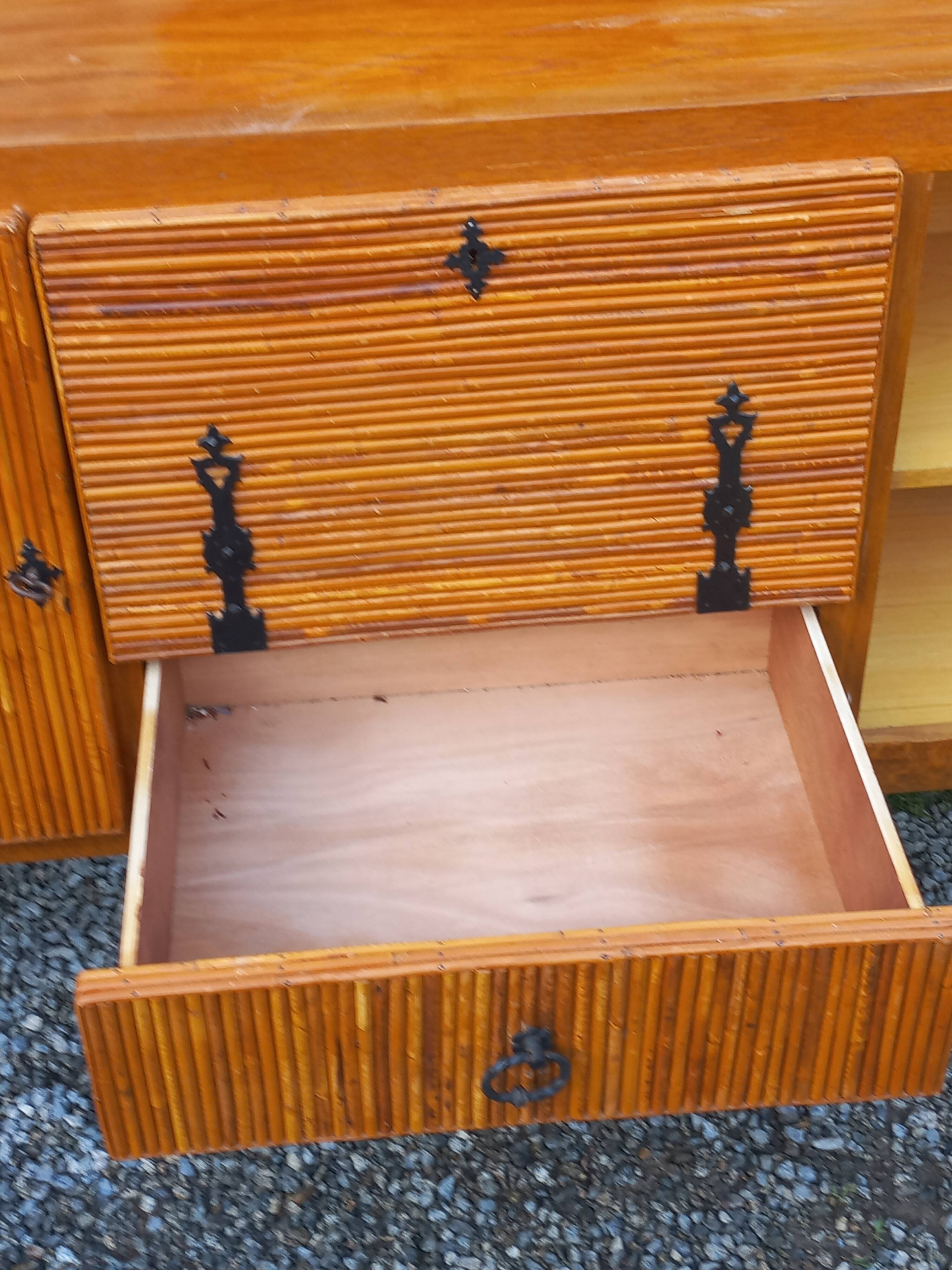 Bamboo and rattan enfilade attributed to Audoux and Minet.