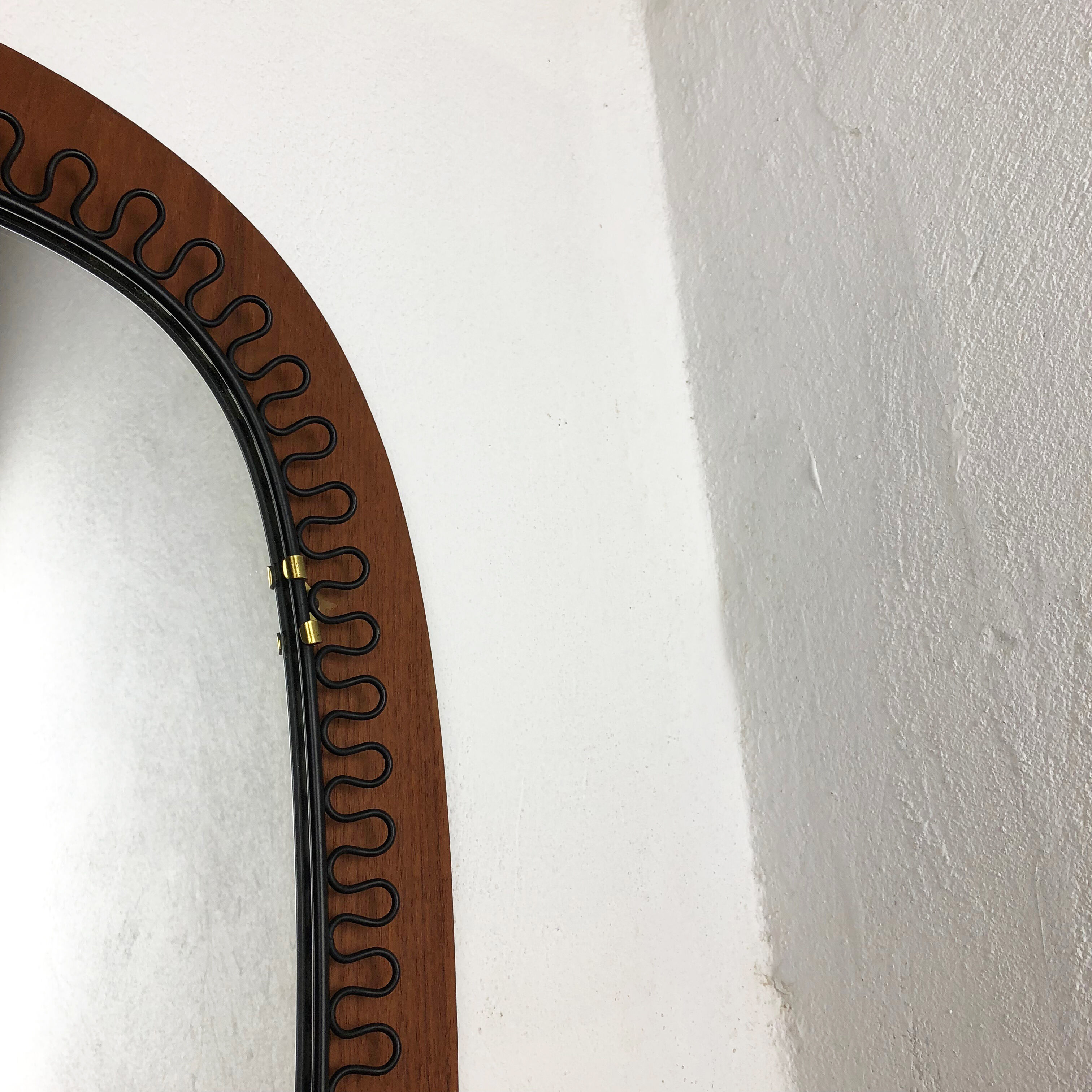 1960 s Scandinavian metal + teak mirror 54cm designed by Josef Frank for Svenskt Tenn, made in Sweden. midcentury modern. Danish modern