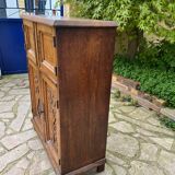 Low carved wooden sideboard