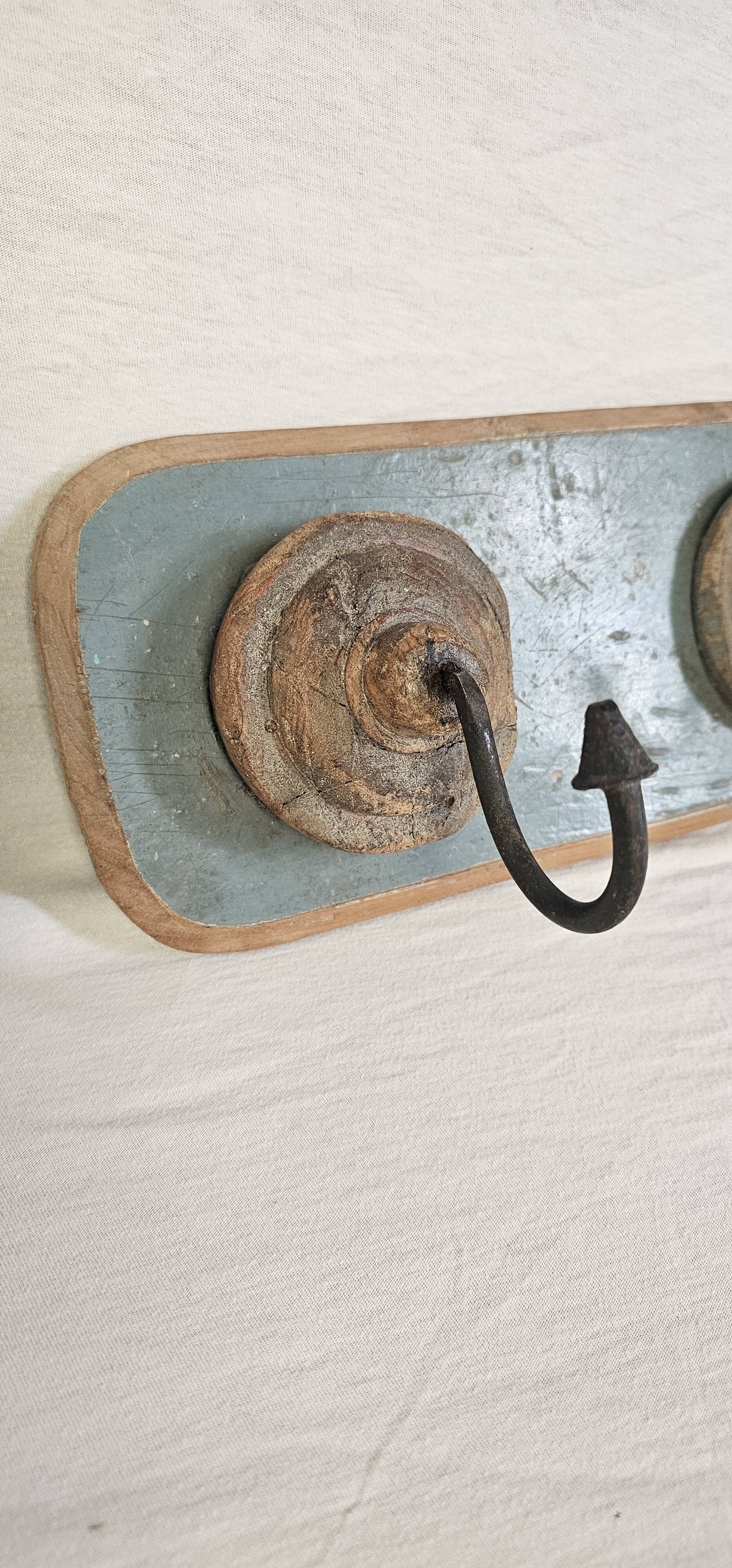 Antique teak coat rack with 3 wrought iron hooks
