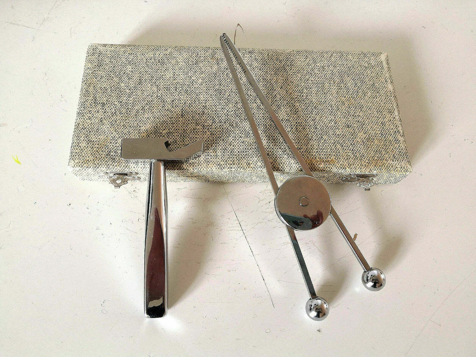 Ice pliers and ice hammer by Jacques Adnet