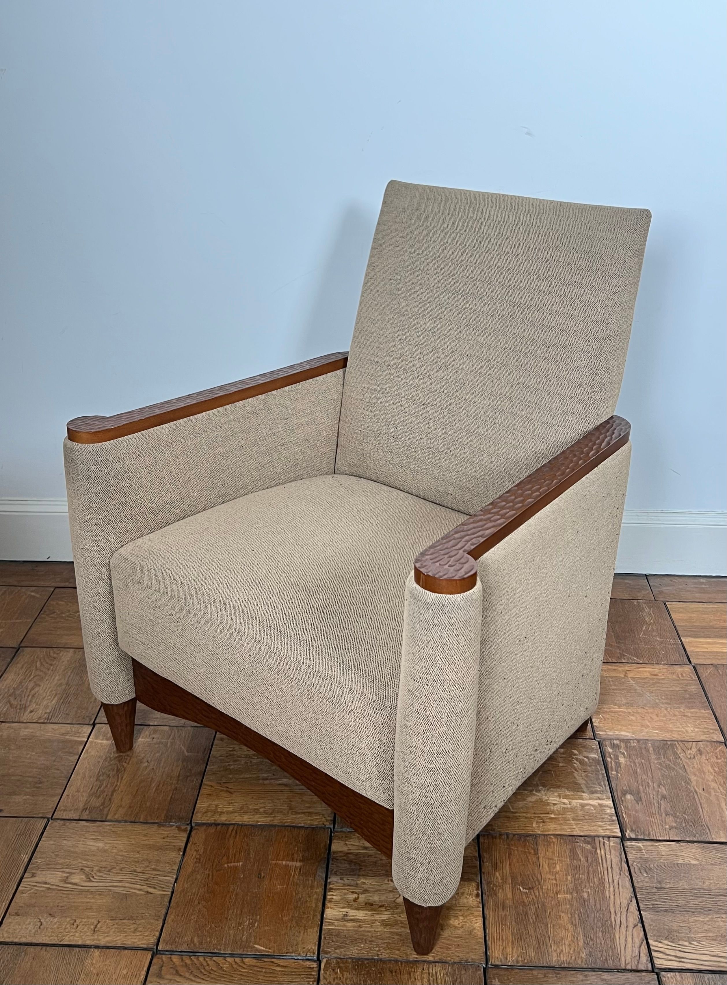 Pair of armchairs in carved wood and vintage fabric