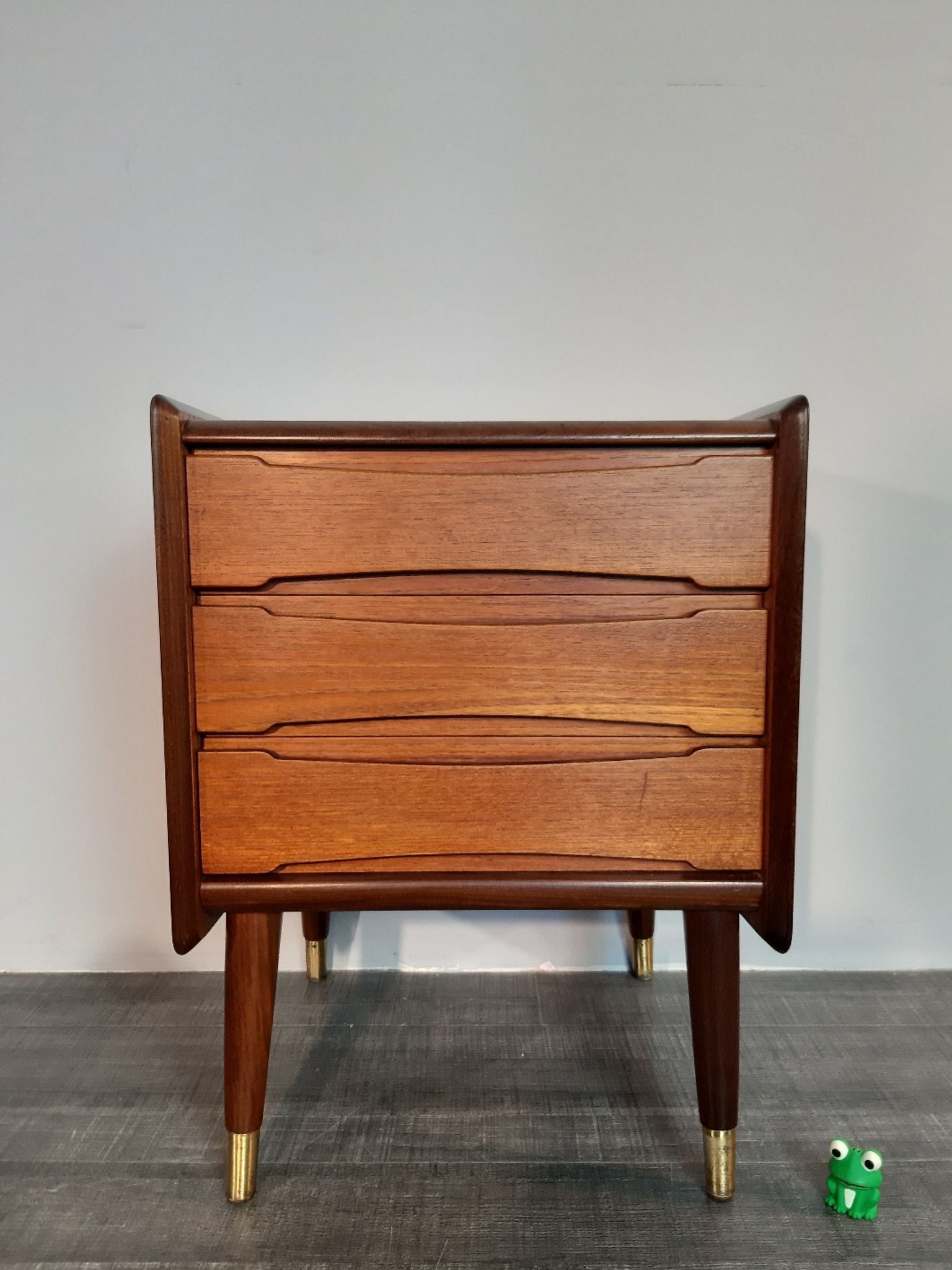 Norwegian bedside table with 3 drawers, teak and brass clogs