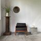 Modernist armchair in exotic wood and leather